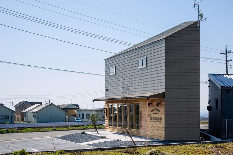 image: SNARK + OUVI’s timber dwelling houses a barber shop ... by availableviridian