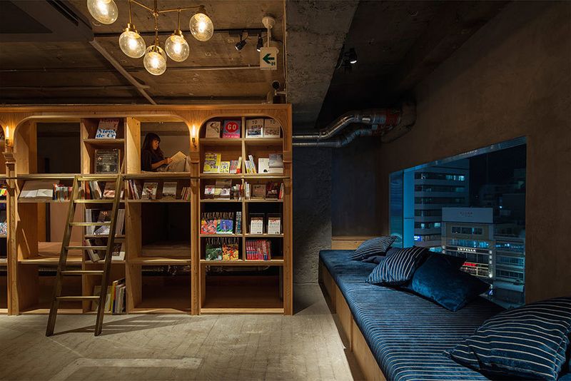 image: Bookstore-Themed Hotel by wastedyouth