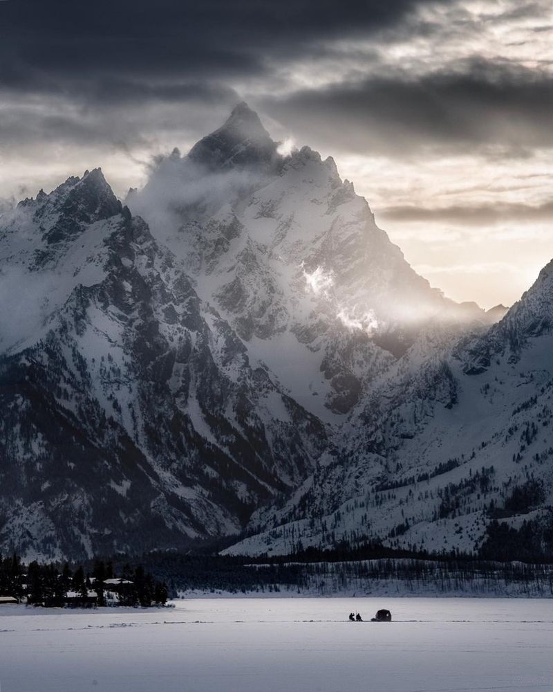 image: A couple of Ice Fishermen catching their dinner in Grand Teton National Park. ....#folkgood #beautifuldestinations #ourplanetdaily#shotzdelight #visualsoflife #ourplanetdaily#artofvisuals #moodygrams #agameoftones #livefolk#mindzeye#createcommune #cre by mindzeye