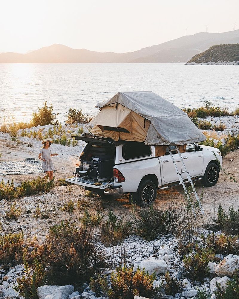 image: Why do I love camping so much? Give me a private beach, a rooftop tent, a solar shower warmed by the burning sun and mountains in the background and I'm a happy man. Of all the nights since the beginning of this trip, the ones spent sleeping in the... by lebackpacker