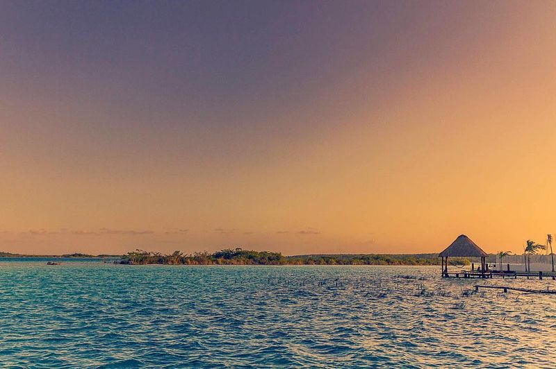 image: Wonderful sunset in Bacalar ❤️....#bacalar #quintanaroo #mexico #mexicolors #mexicoinmypocket #mexicotravel #mexico_maravilloso #mexicodesconocido #ig_mexico #ig_color #ig_shotz #ig_travel #beautifuldestinations #shotzdelight #travellingthroughtheworl by majolophoto