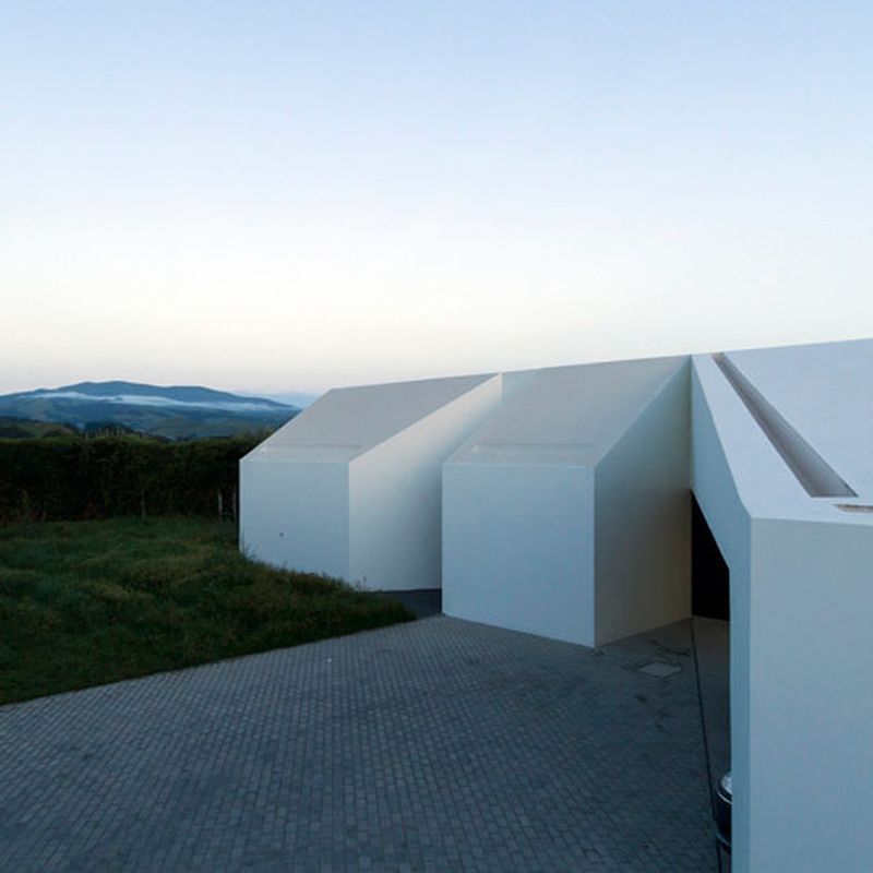 image: Casa Rosto do Cão by M-Arquitectos is fronted by fou... by waryamaranth