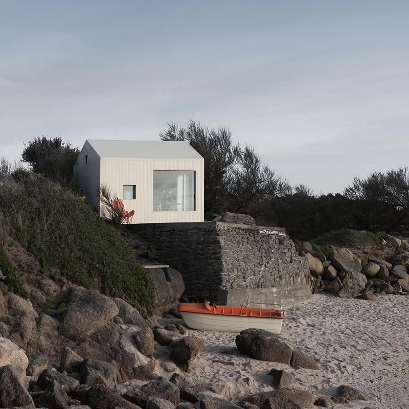 image: The Viking seaside summer cabin by FREAKS freearchitects is a refurbished concrete fishing shack facing the sea Fermanville, France/ It was built in the 50's on a rock, on the beach, and the majority of the work consisted in cahnging the roofing and... by architizer
